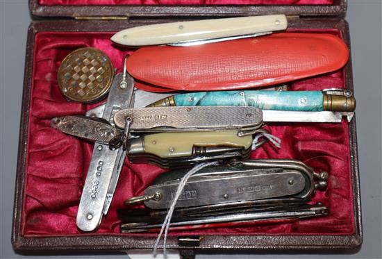 Fifteen silver, ivory, malachite and other folding penknives, including multi-function and miniature examples.